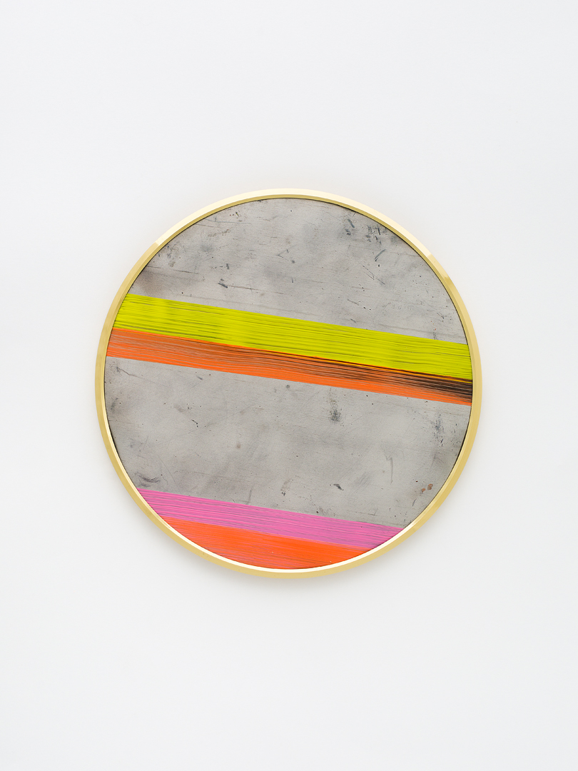 Golden framed, round painting on lead with horizontally diagonal stripes in yellow, orange and pink. Grey lead surfaces above and in the middle.